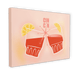 The Cin Cin Matte Canvas Print by Hôtel Dodo showcases two stylized glasses of red beverage with lemon slices, with the text "CIN CIN" above. The light peach background enhances the zesty retro print vibe, reminiscent of Hôtel Dodo's tropical foliage decor.
