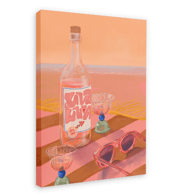 Giclée canvas print of a beach scene titled "Hôtel Dodo Uva Luva" featuring a bottle labeled "Viva" and two cocktail glasses on a striped surface, with pink sunglasses in the foreground and the ocean glowing under a beautiful sunset in the background, by Hôtel Dodo.