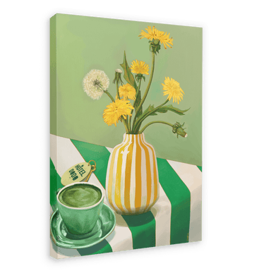 The Matcha Mornings Giclée Canvas Print by Hôtel Dodo portrays a green tea cup, a teabag, and a vase with yellow dandelions on a green and white striped tablecloth, evoking serene mornings.