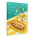 A giclée canvas print named "Poolside Hotdog" by the brand Hôtel Dodo features an illustration of a hotdog with mustard on a yellow checkered tablecloth, accompanied by a vase of flowers and a bottle of Hôtel Dodo mustard. The scene is set against a backdrop of tropical foliage and a sparkling pool.