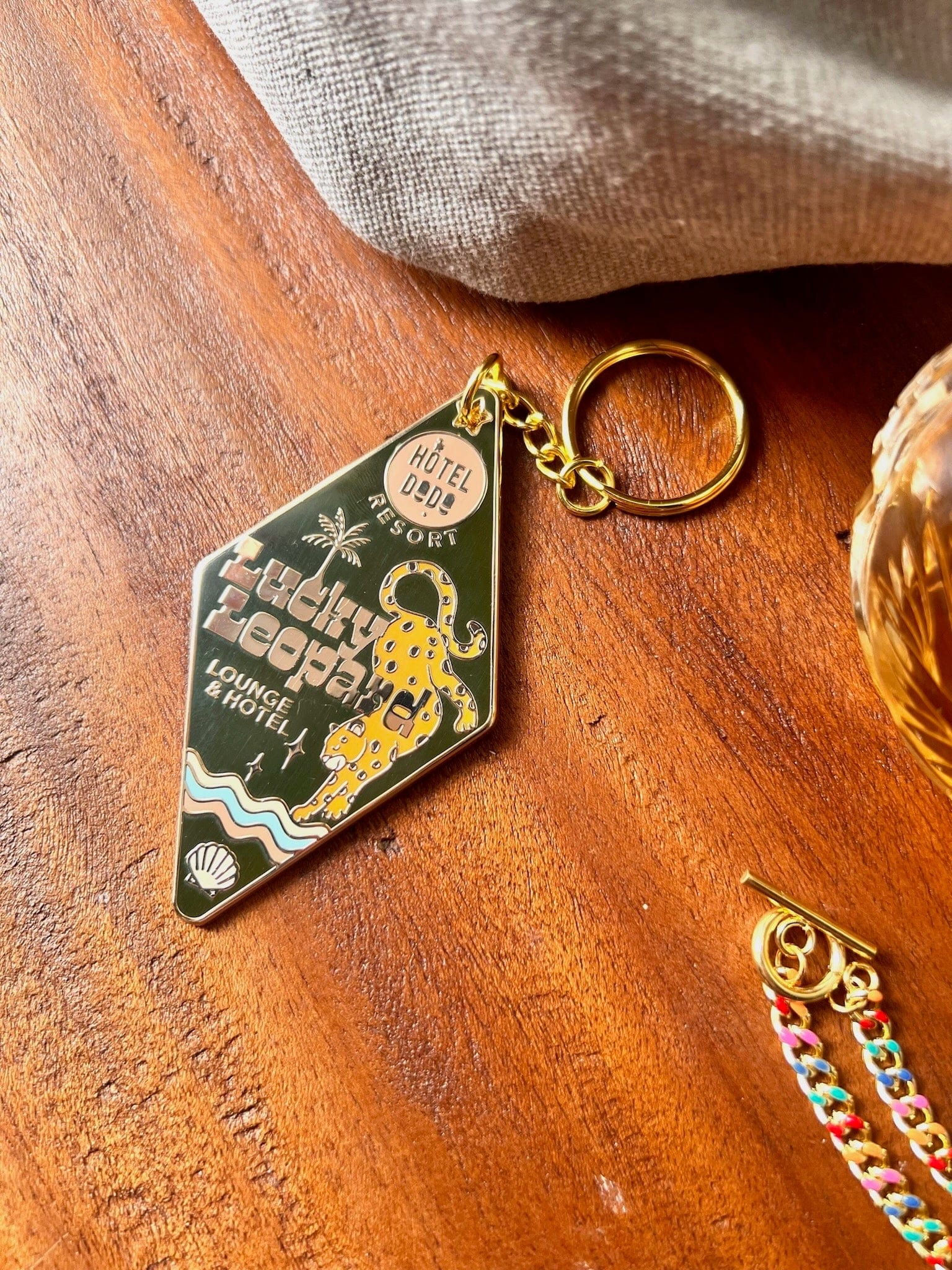Lucky Leopard Lounge Motel Keyring - OLIVE (Trade Pack 4)