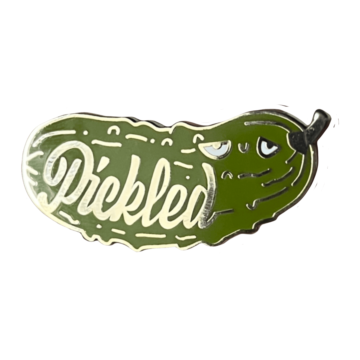 A tiny cucumber-shaped cartoon pickle pin by Pins by diedododa, featuring the word "Pickled" and an expression with raised eyebrows.