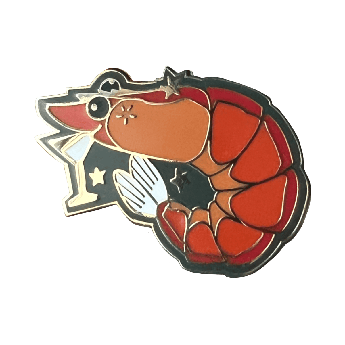 The Prawn Cocktail Pin by Pins by diedododa features an orange prawn with a star-topped wand, surrounded by small stars on a black background, capturing the charm of a whimsical cocktail party.