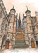 The New College Edinburgh Uni Art Print by Essential Edinburgh features a grand stone building with towers, arched windows, wide steps to wooden doors, and a tall spire rising gracefully in the background.