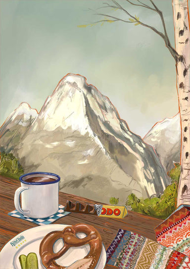 An Alpine Air Giclée Art Print by Hôtel Dodo features a mug, pretzel, and Swiss chocolate bar on a table against majestic mountain scenery, evoking the warmth of a cozy alpine lodge.