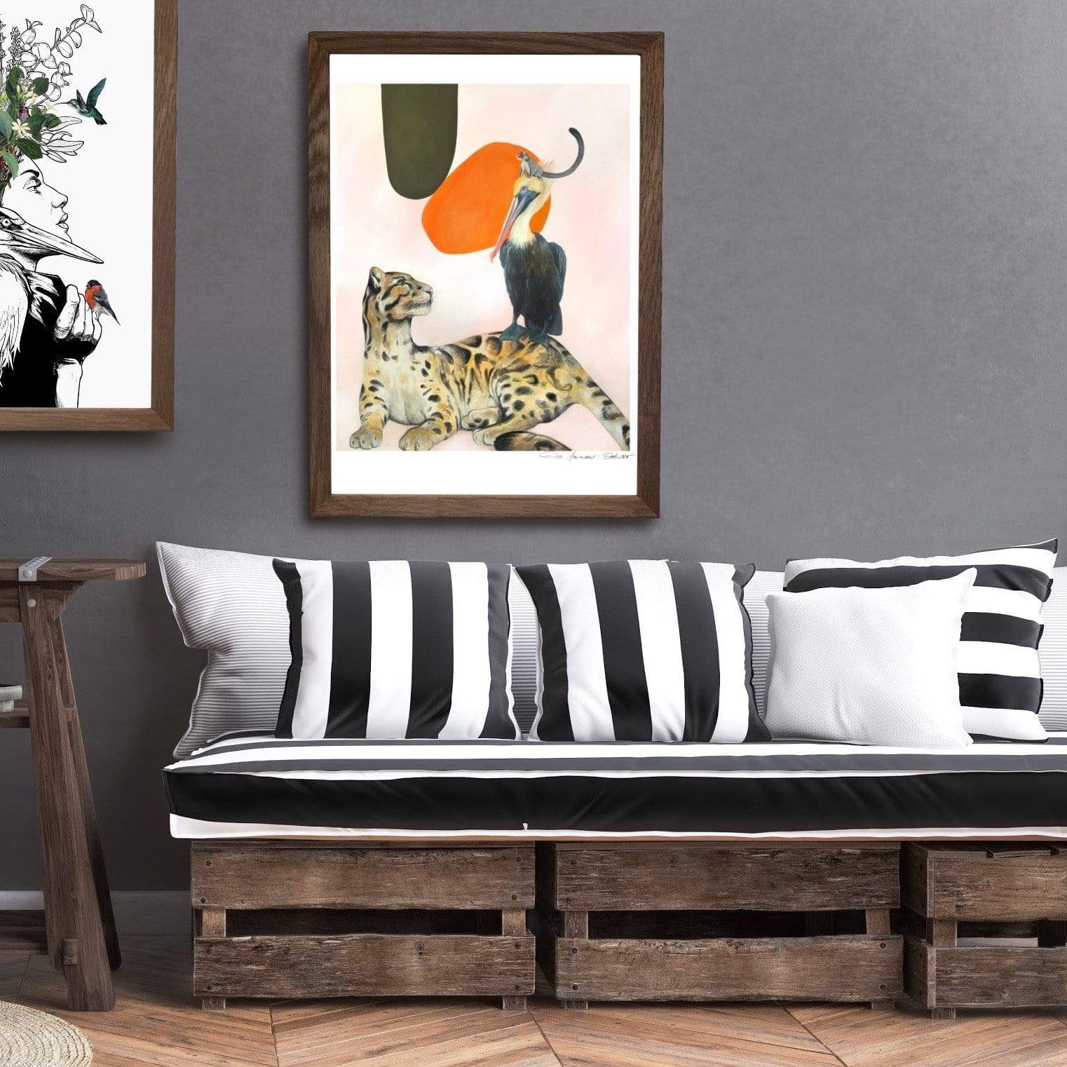 A living room featuring the artwork of Des Animaux